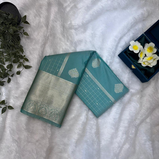 Kanchi Soft Silk Saree in Teal Green with Silver Zari