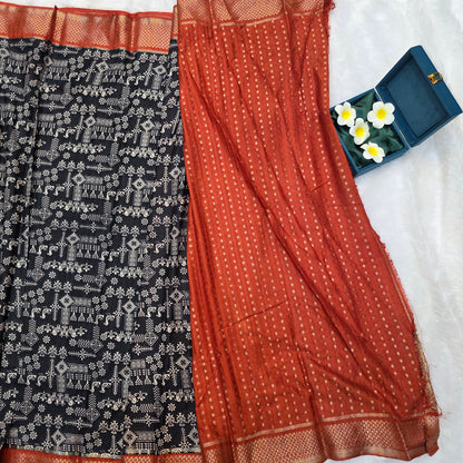 Pochampalli Tussar Saree in Black and Rust Red with Traditional Ikat-Inspired Motifs