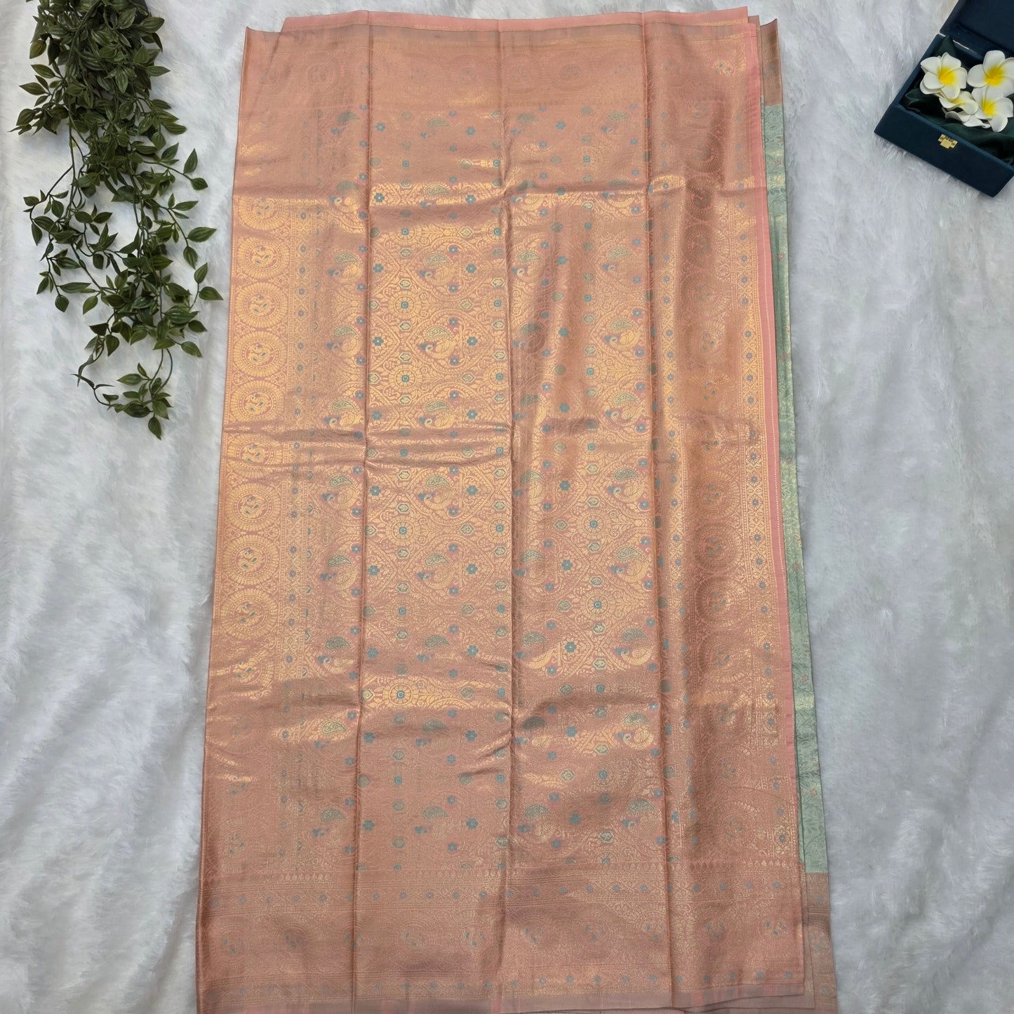 Kanchi Budget-friendly Soft Silk Saree in Pastel Mint Green with Peach Gold Contrast and Antique Gold Zari