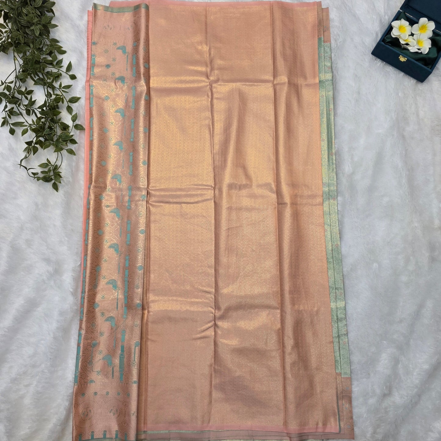 Kanchi Budget-friendly Soft Silk Saree in Pastel Mint Green with Peach Gold Contrast and Antique Gold Zari