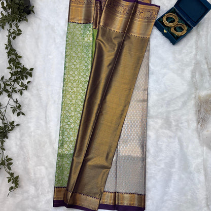Kanchi Soft Silk Saree in Leaf Green with Antique Gold Zari and Purple Border